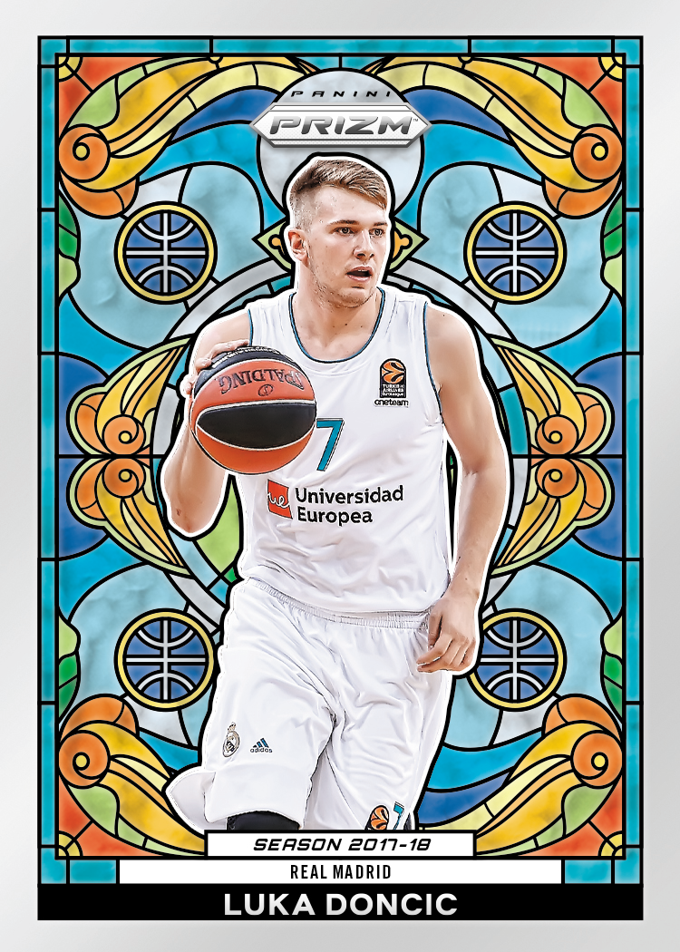 Panini Prizm Stained Glass promotional card featuring Luka Dončić in a white Real Madrid uniform holding a basketball, surrounded by a colorful ornamental border. The card reads “Season 2017–18.”