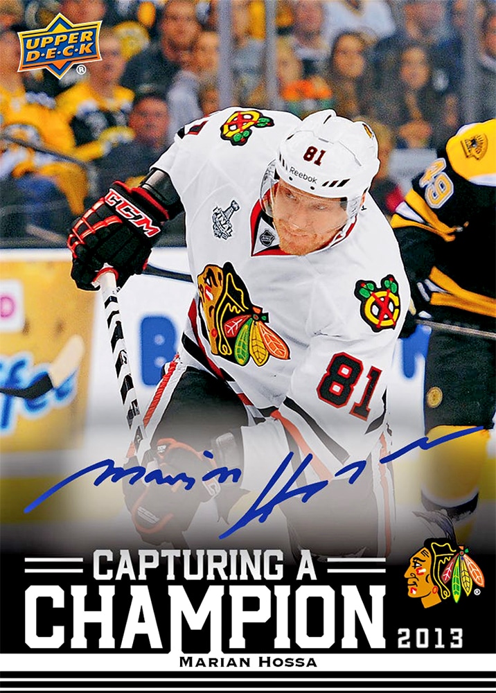 Marian Hossa Capturing a Champion autograph preview with white Blackhawks sweater, blue signature and 2013 title.