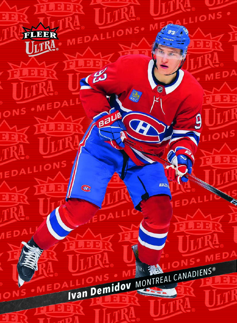 Ivan Demidov in Montreal red and blue against the red repeating-logo background of Ruby Red Medallions.