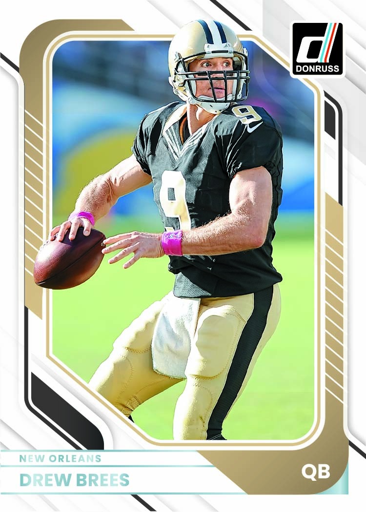 Drew Brees in a black New Orleans uniform inside a white, black and gold angular Donruss frame.