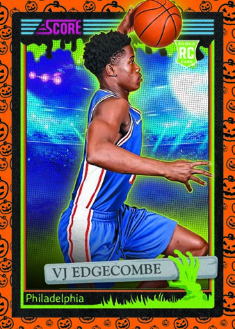 VJ Edgecombe rises toward the basket inside an orange pumpkin-patterned border.