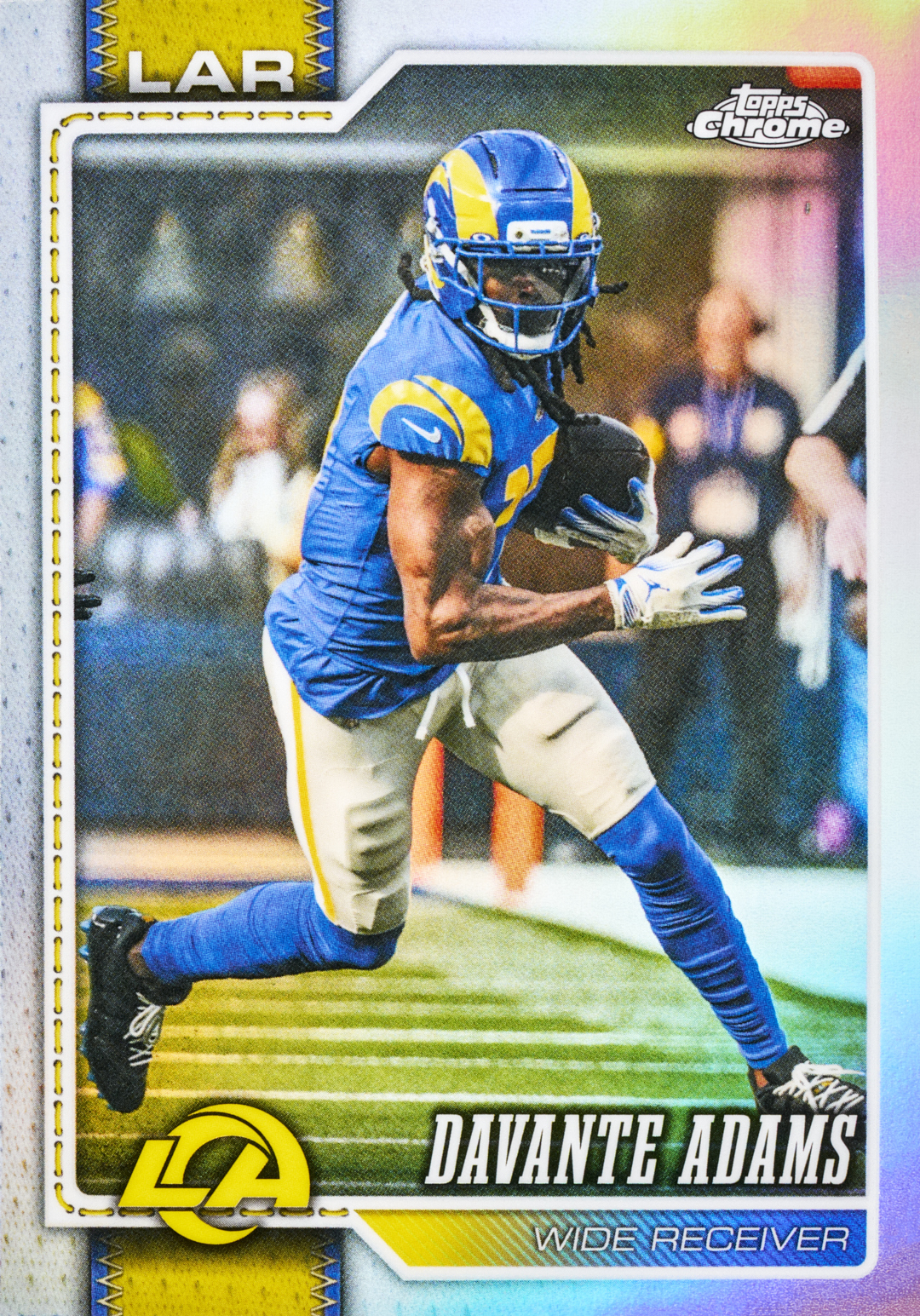 Davante Adams carrying the ball in a blue Rams uniform, framed by blue and yellow accents.