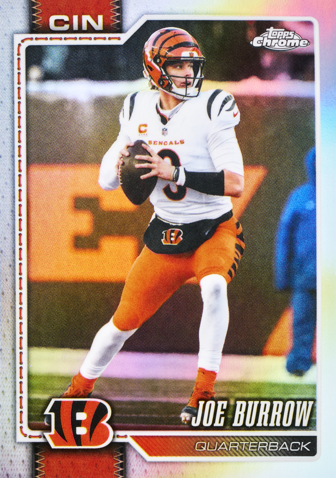Joe Burrow's base Refractor preview, with orange Bengals accents, a white frame and a passing pose.