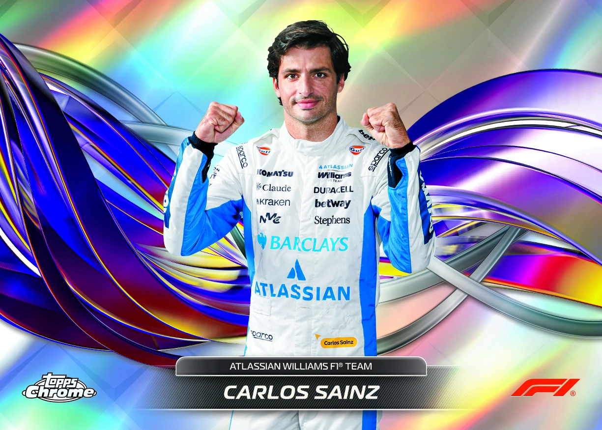 Carlos Sainz raises both fists in a Williams racing suit on a horizontal 2026 Topps Chrome Formula 1 Helix card with sweeping multicolored ribbons.