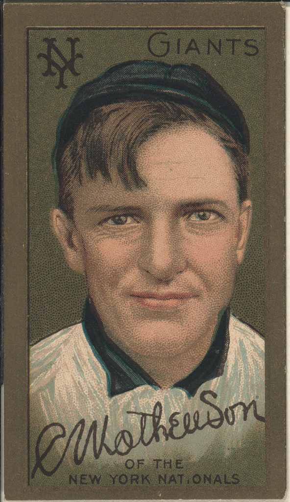 Christy Mathewson on an original 1911 T205 New York Giants card, with a plain portrait panel, team lettering and a printed facsimile signature.