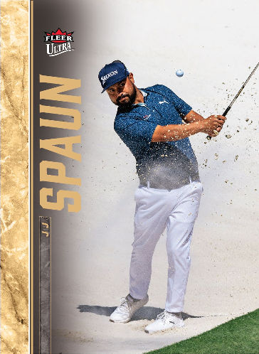JJ Spaun hitting out of sand, with the ball suspended above his shoulder and a gold-toned vertical name strip.