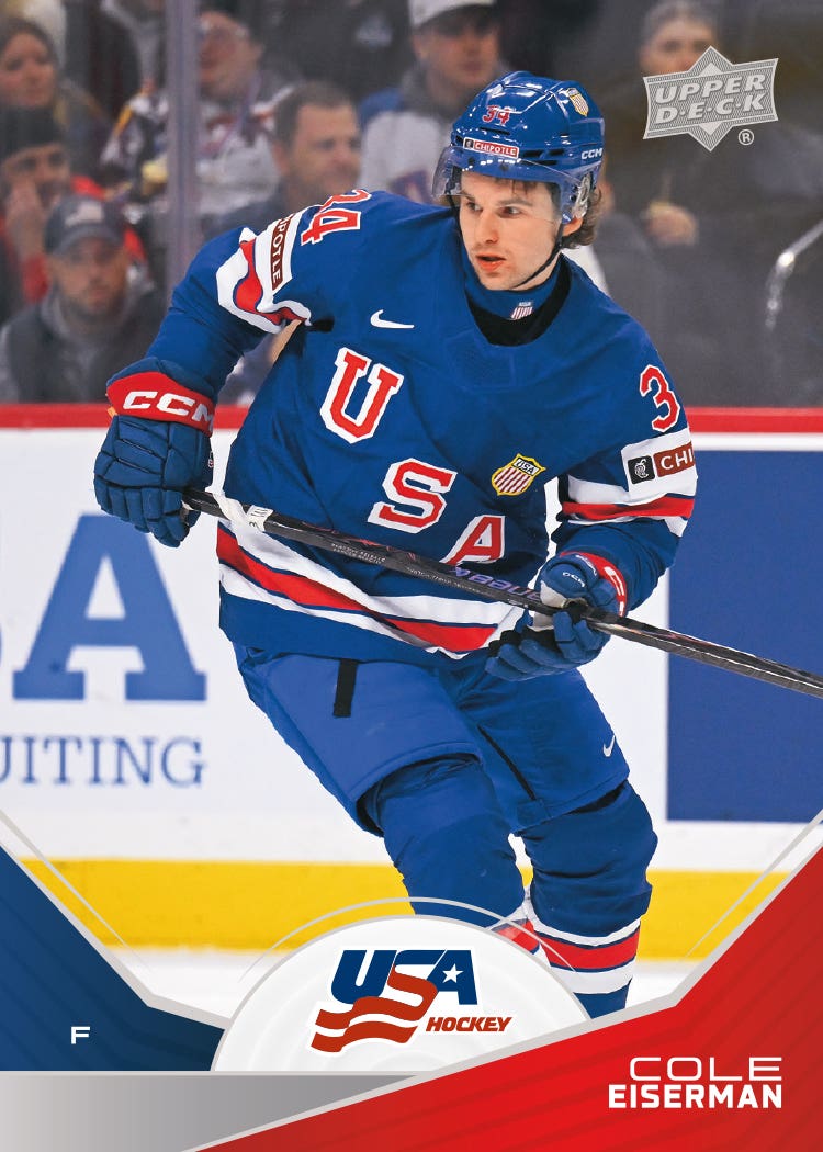 Cole Eiserman in a blue USA jersey on his 2026 Team USA Juniors base card, with red and navy panels around the USA Hockey logo.